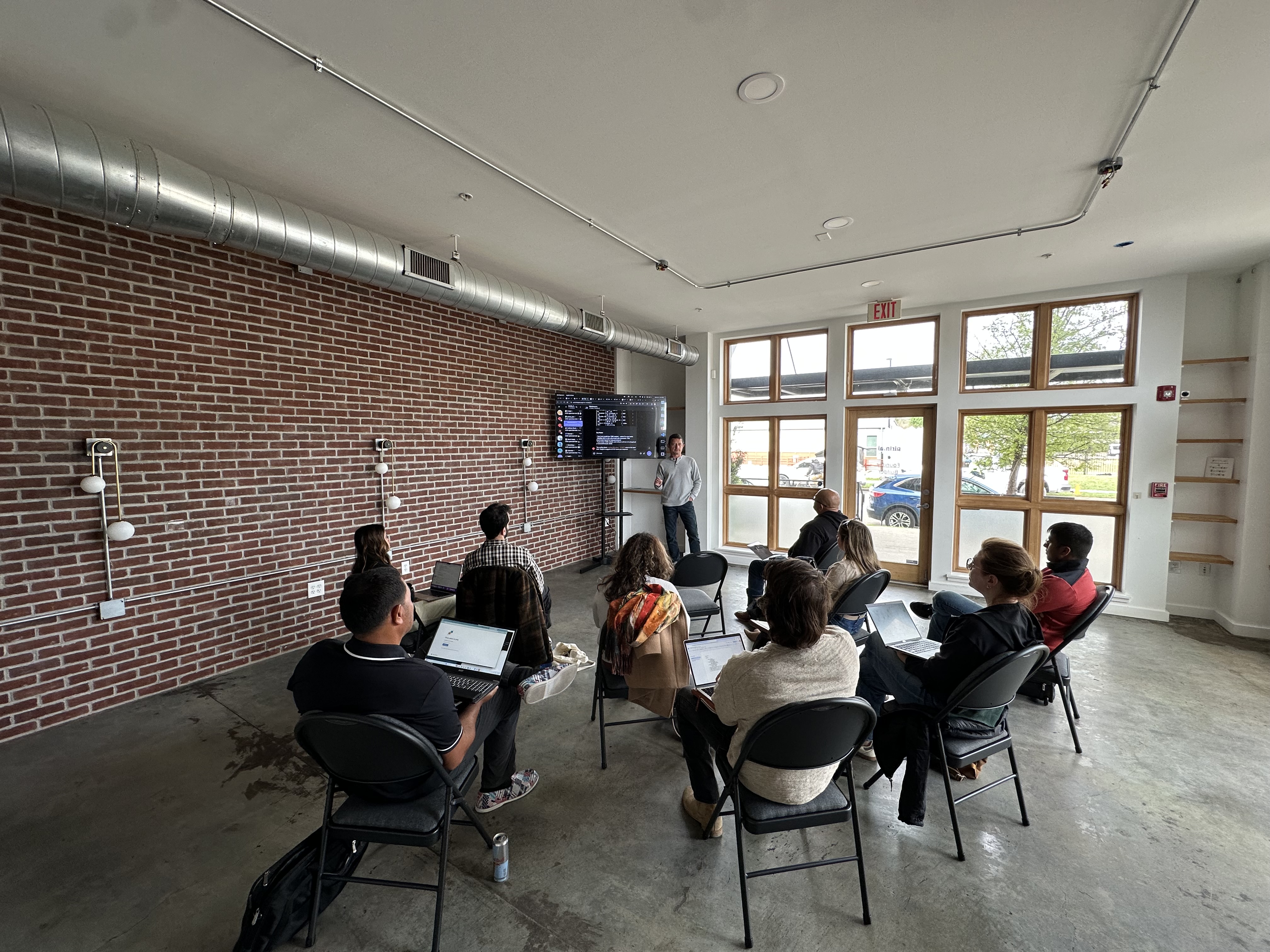 Live demo session at the SXSW Building Teams with Agents meetup, founders with laptops open following along